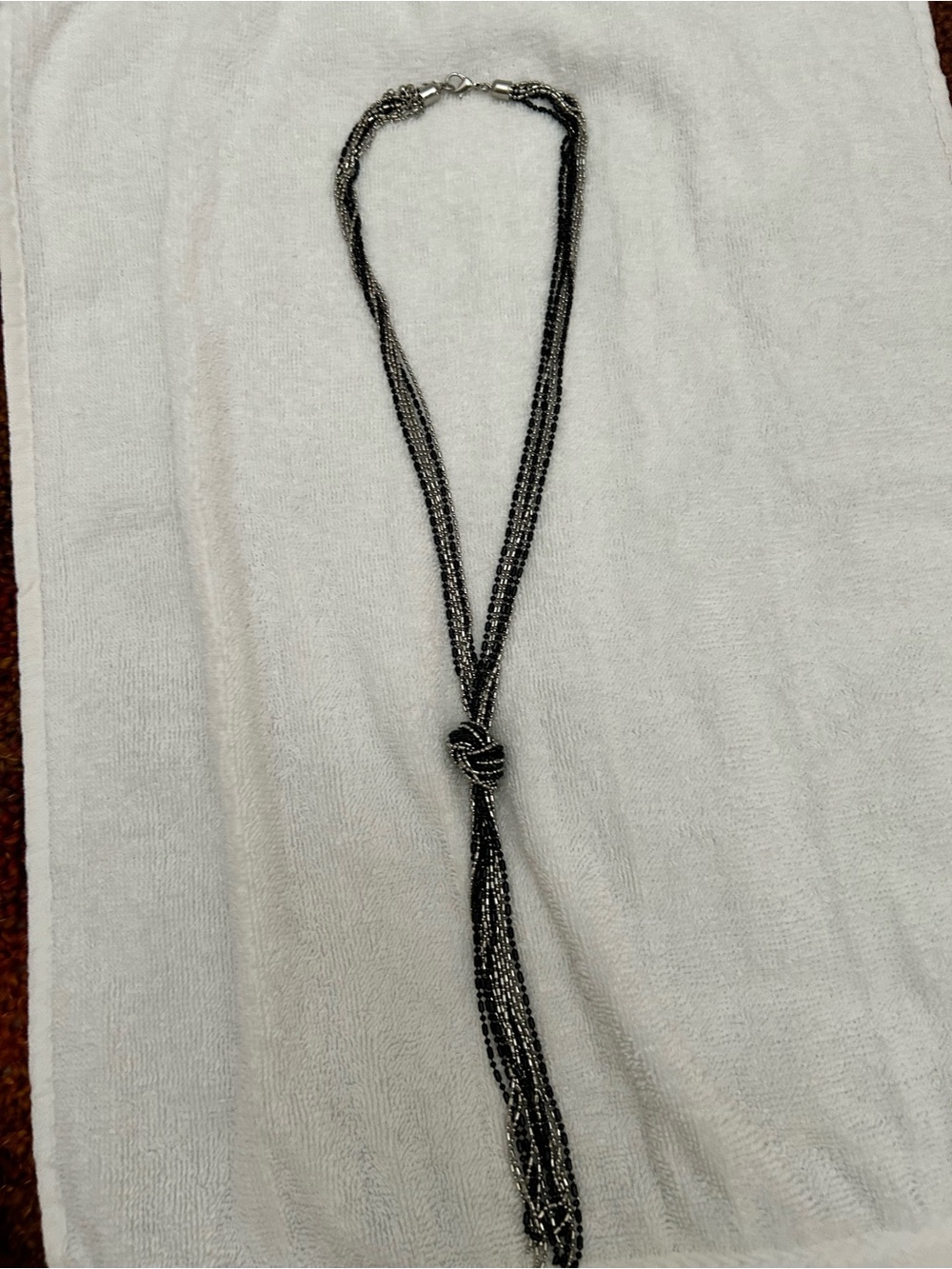 Multi-Strand Knot Pendant Necklace in Black and Silver